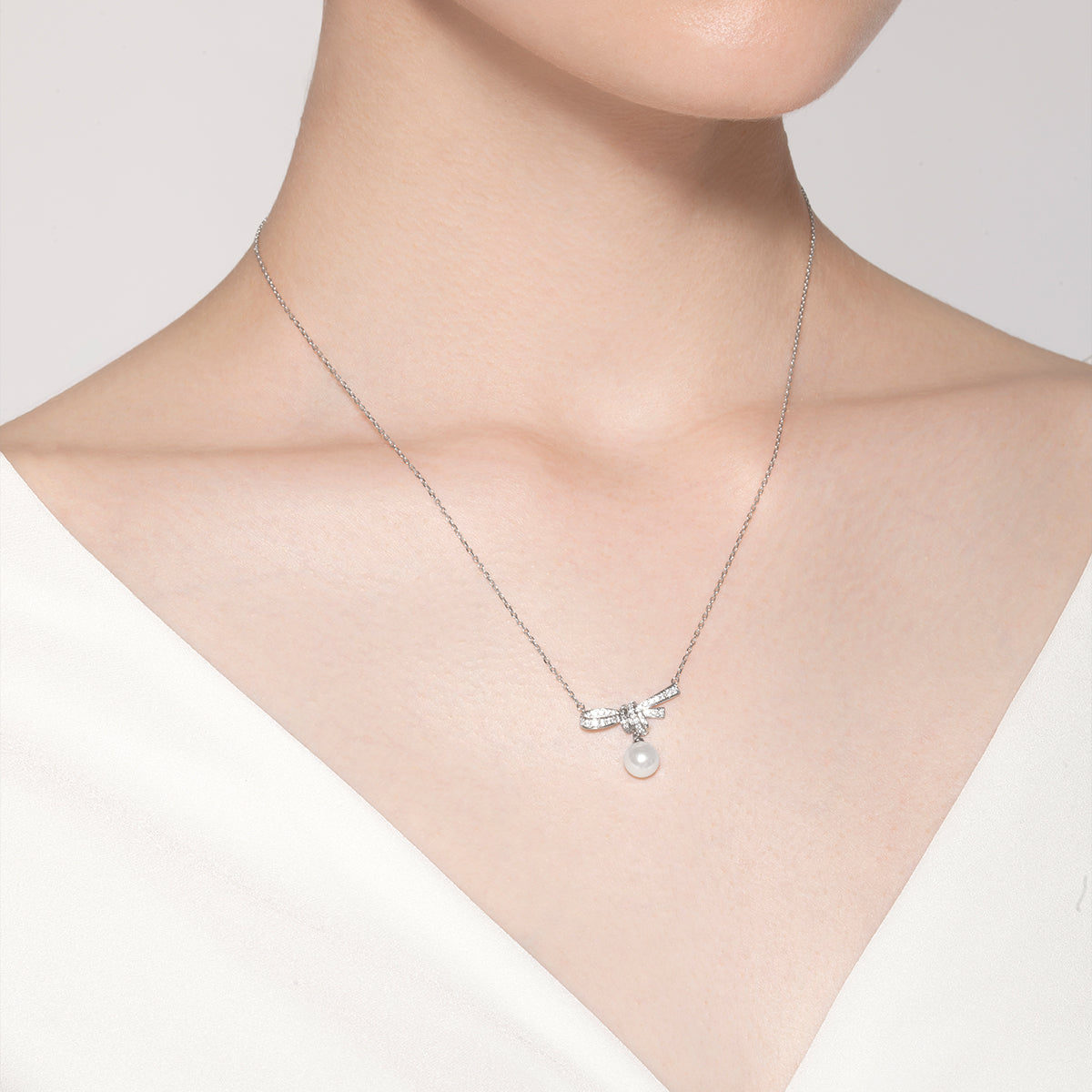 Akoya Pearl 18K White Gold Knot Diamond Necklace