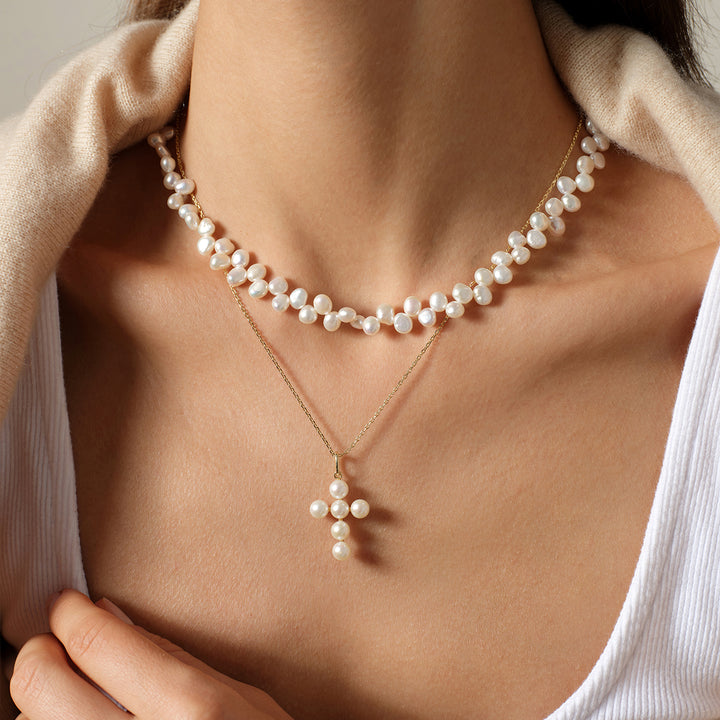 Model layering freshwater pearl butterfly clasp necklace with pearl cross pendant necklace
