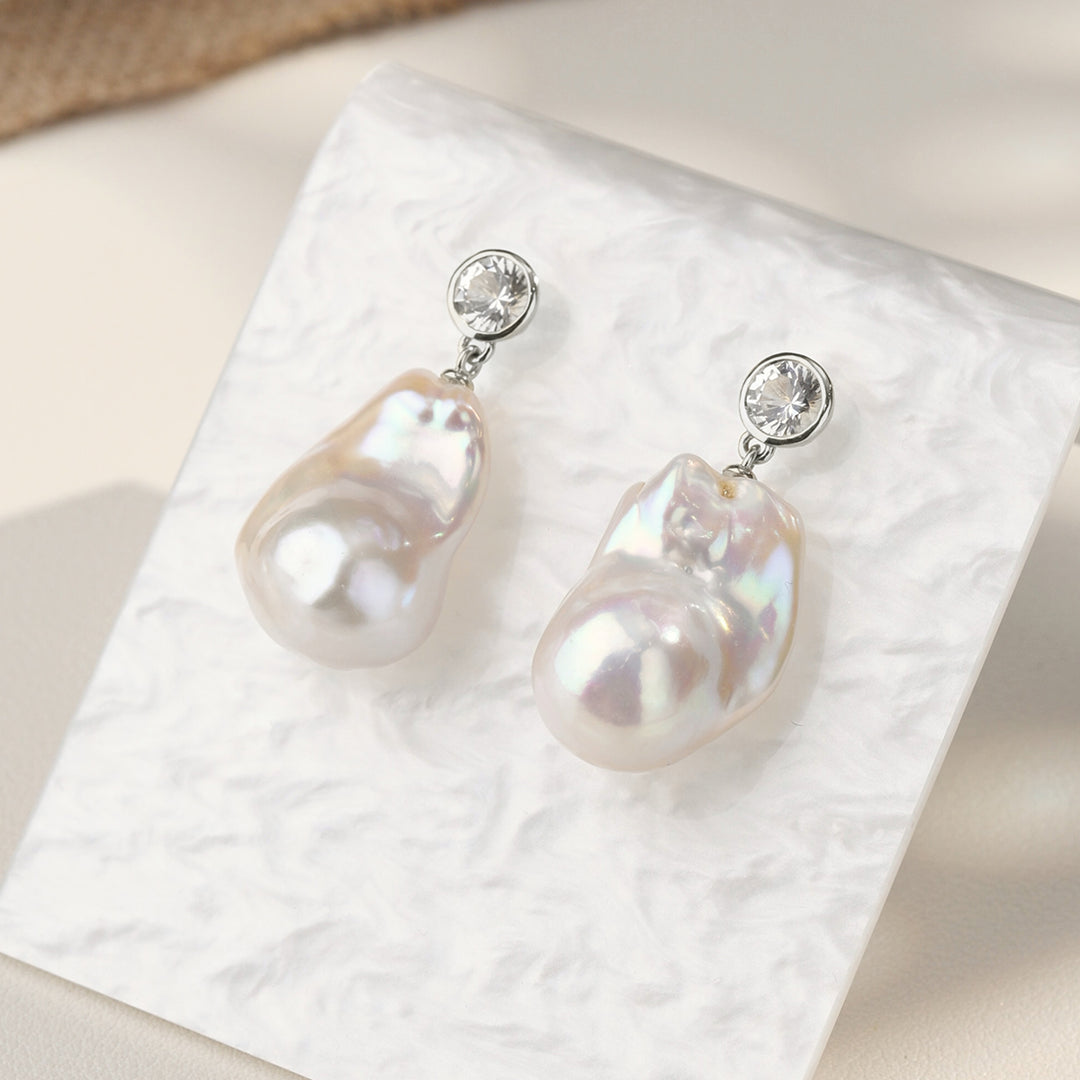 Baroque freshwater pearl necklace with CZ in rhodium-plated sterling silver displayed on white pearlescent card