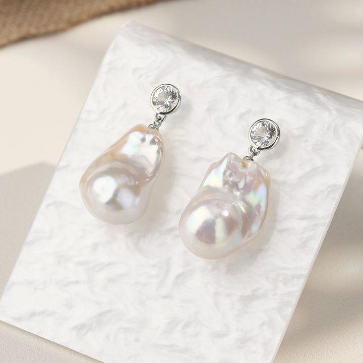 Baroque freshwater pearl necklace with CZ in rhodium-plated sterling silver displayed on white pearlescent card