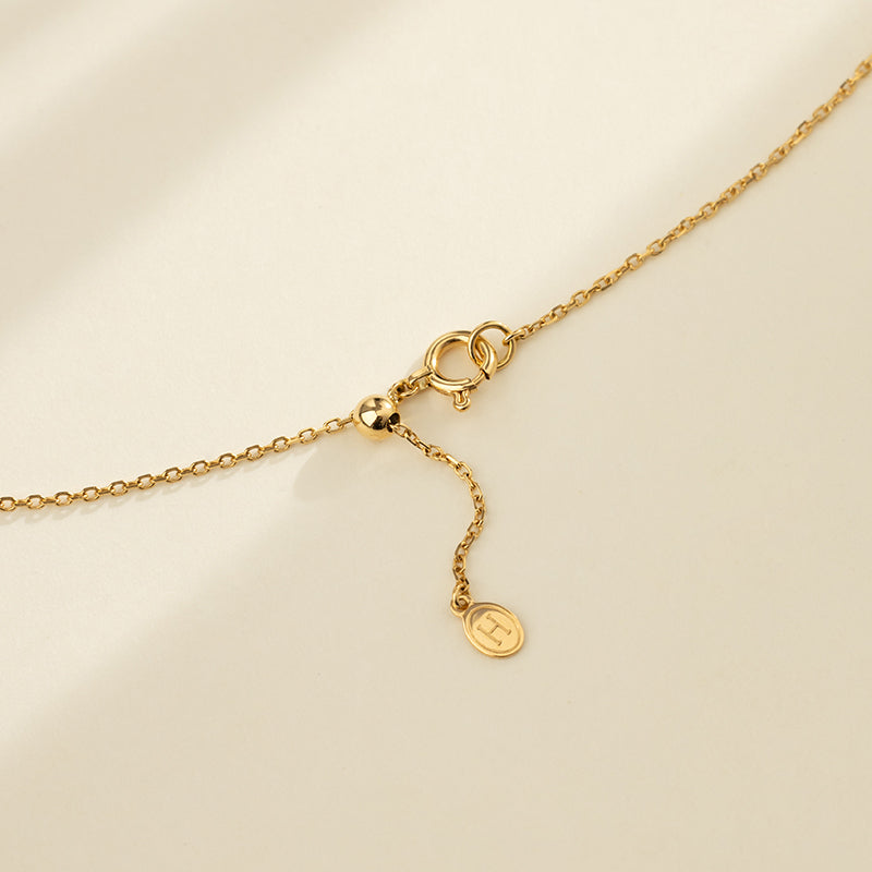 Gold vermeil spring ring clasp with adjustable bead and H logo tag detail, 925 sterling silver chain
