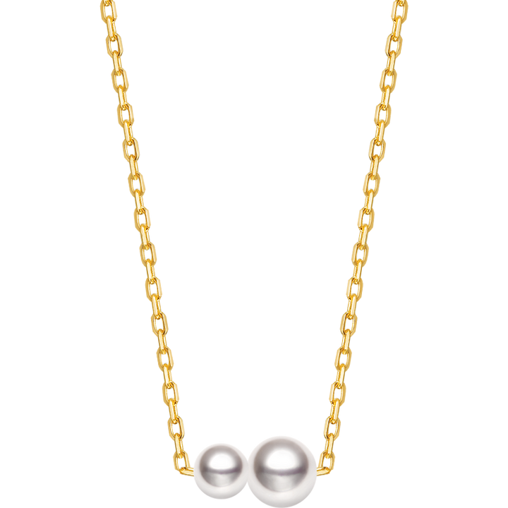 Twin saltwater pearl minimalist 18K gold necklace from Basic Collection, featuring a sleek, elegant design with two pearls.
