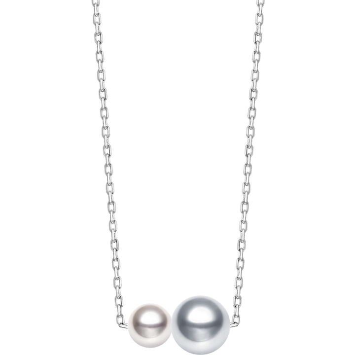 Twin saltwater pearl minimalist 18K gold necklace from Basic Collection featuring two elegant pearls on a delicate chain.