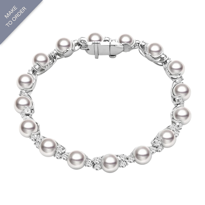 Elegant Akoya pearl and diamond bracelet in 18K white gold from Bridal Collection, showcasing lustrous pearls and sparkling diamonds.