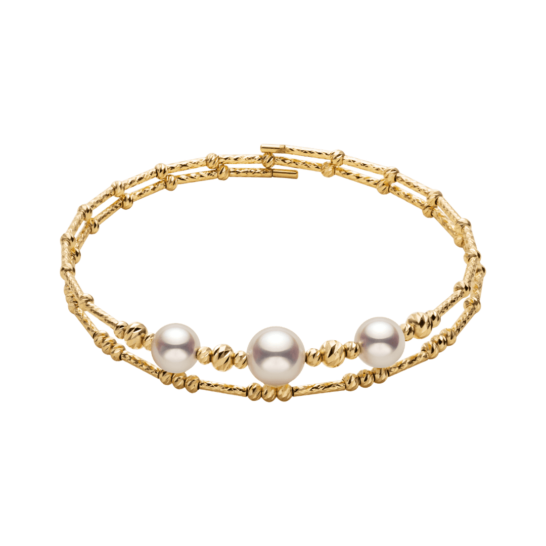 Gold vermeil sterling silver double-layer stretch bracelet with freshwater pearls, flat lay