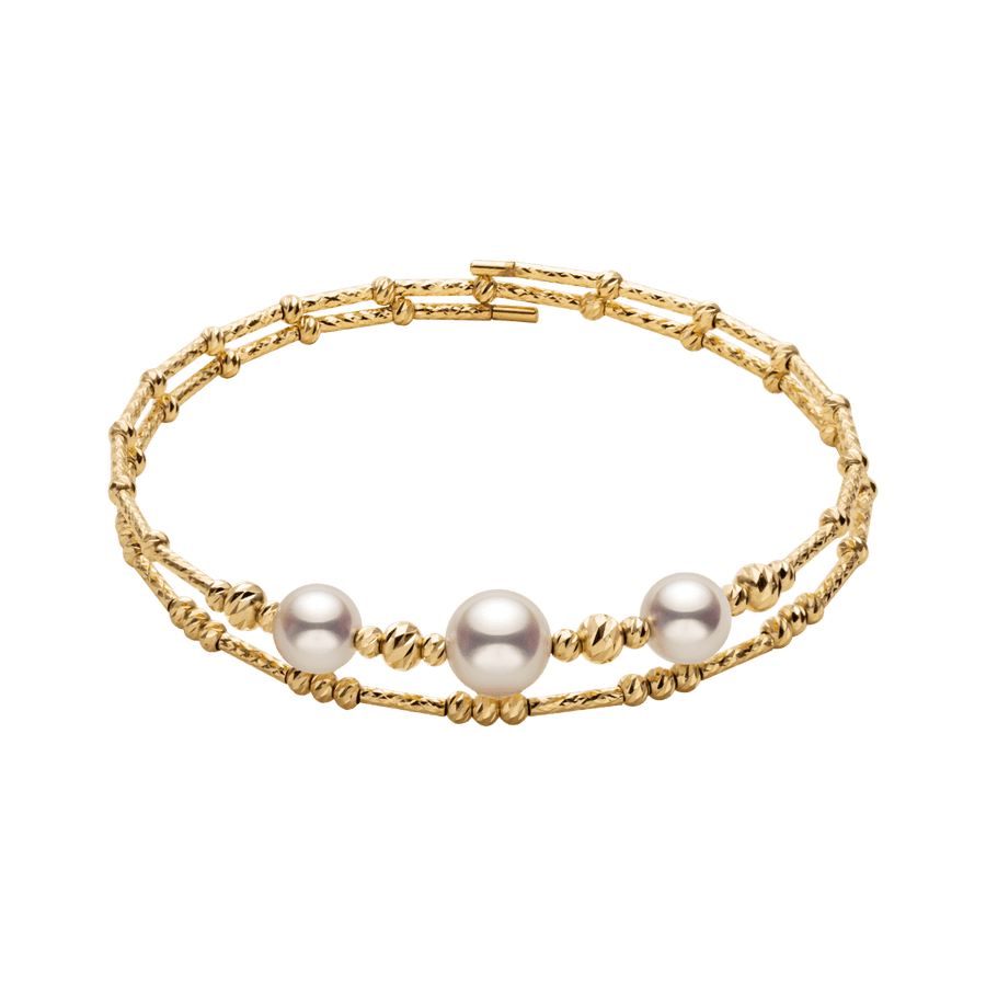 Gold vermeil sterling silver double-layer stretch bracelet with freshwater pearls, flat lay