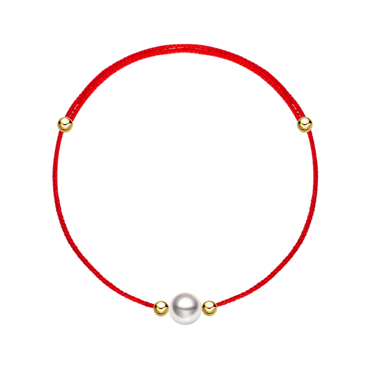 Akoya saltwater pearl 18K gold string bracelet from Exclusive Collection featuring lustrous pearls on a delicate gold chain.