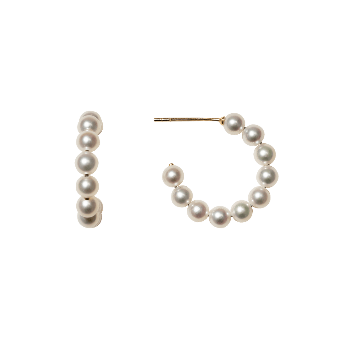 Gold vermeil freshwater pearl circle hoop earrings, pair, flat lay on transparent background