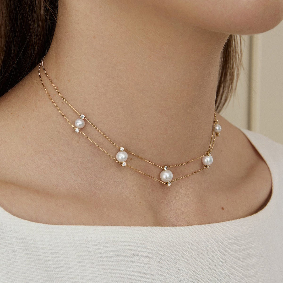Side view of model wearing freshwater pearl lab-grown diamond gold vermeil double strand necklace