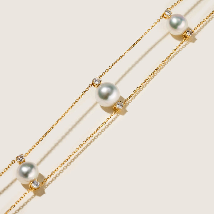 Close-up of AAAAA freshwater pearls and lab-grown diamond stations on gold vermeil sterling silver chain