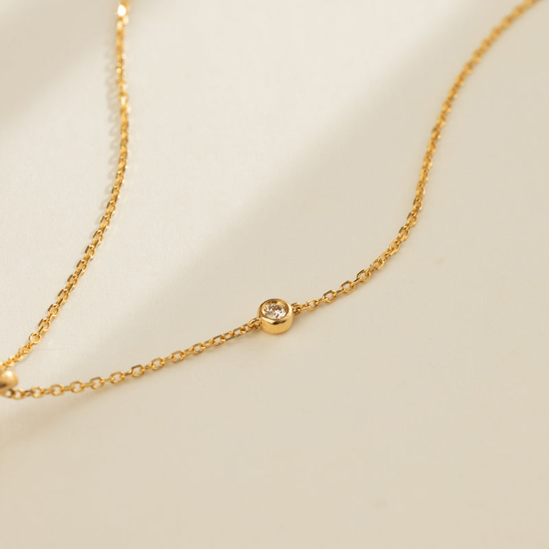 Bezel-set lab-grown diamond station detail on gold vermeil sterling silver chain, PLN0826-SY