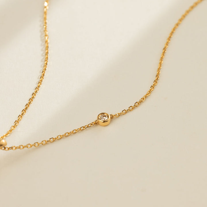 Bezel-set lab-grown diamond station detail on gold vermeil sterling silver chain, PLN0826-SY