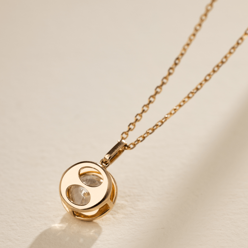 Back detail of lab-grown diamond gold vermeil bezel pendant on sterling silver chain