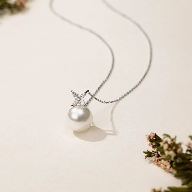 Close-up of AAAAA freshwater pearl and lab-grown diamond flower pendant on sterling silver chain