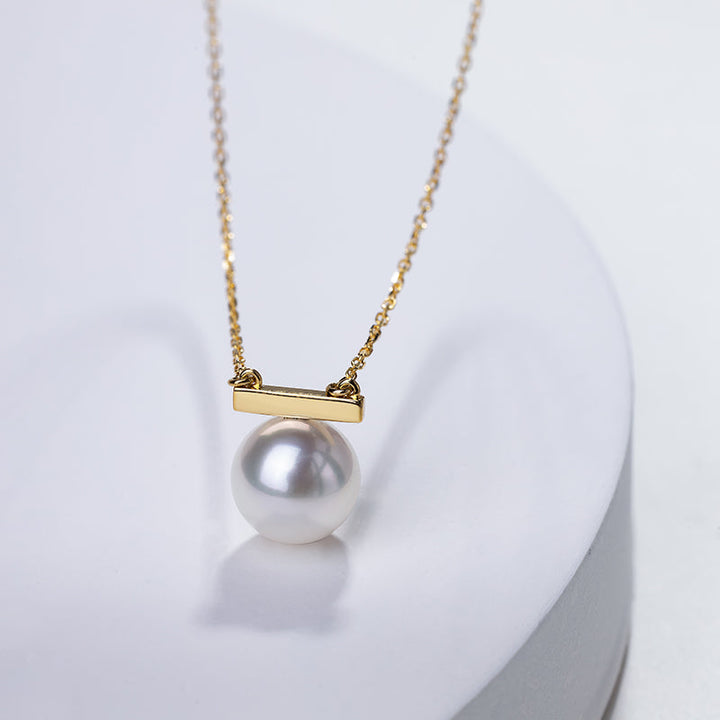 Elegant Akoya Pearl 18K Gold Necklace from Melody Collection featuring a delicate whole rest note pendant.