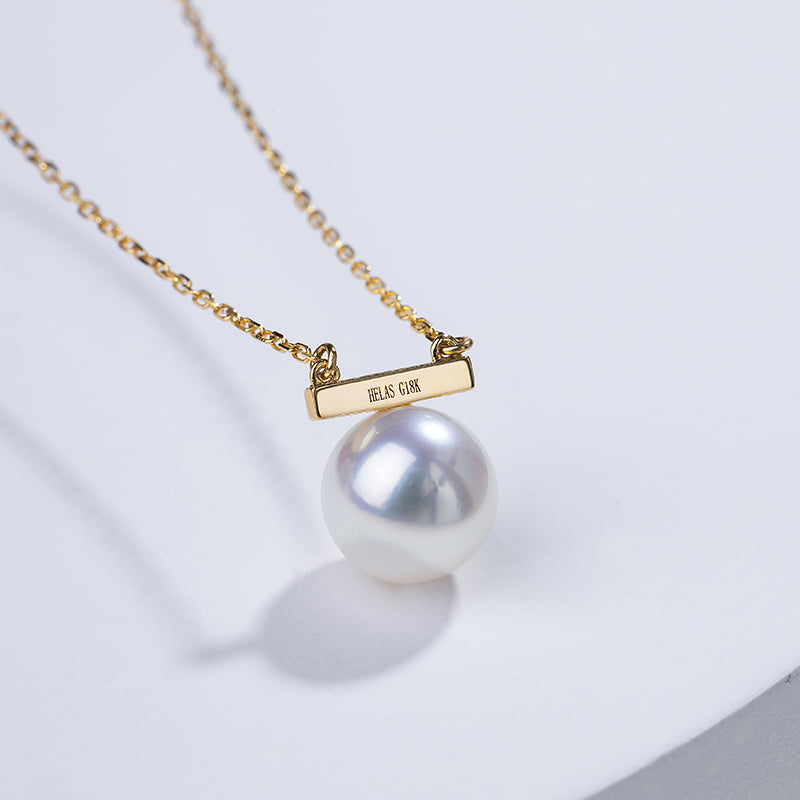 Akoya pearl 18K gold necklace from Melody Collection featuring a delicate rest note pendant on a fine chain.