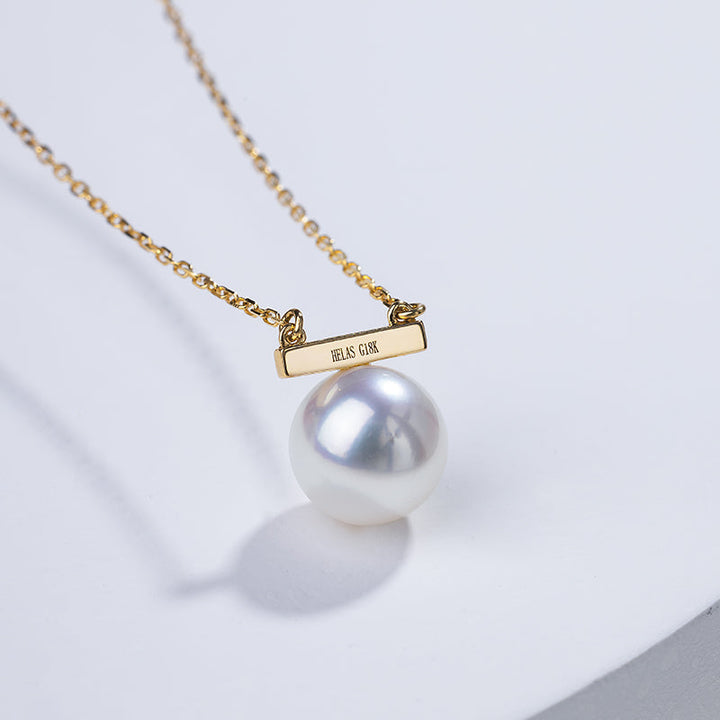 Akoya pearl 18K gold necklace from Melody Collection featuring a delicate rest note pendant on a fine chain.