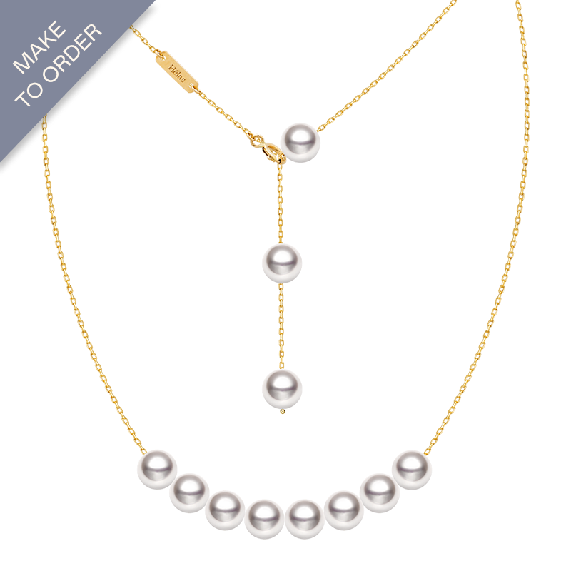 Akoya pearl 18K gold smile necklace from Mermaid's Tear Collection featuring a delicate pearl pendant on a fine gold chain