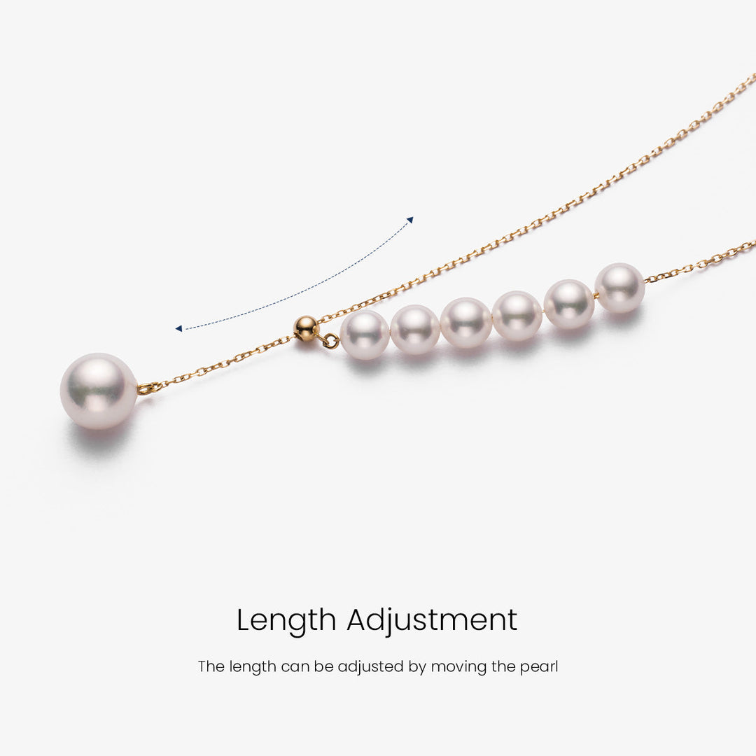 Asymmetrical Akoya pearl necklace with 18K gold chain from Mermaid's Tear Collection, showcasing elegant pearl and gold design.