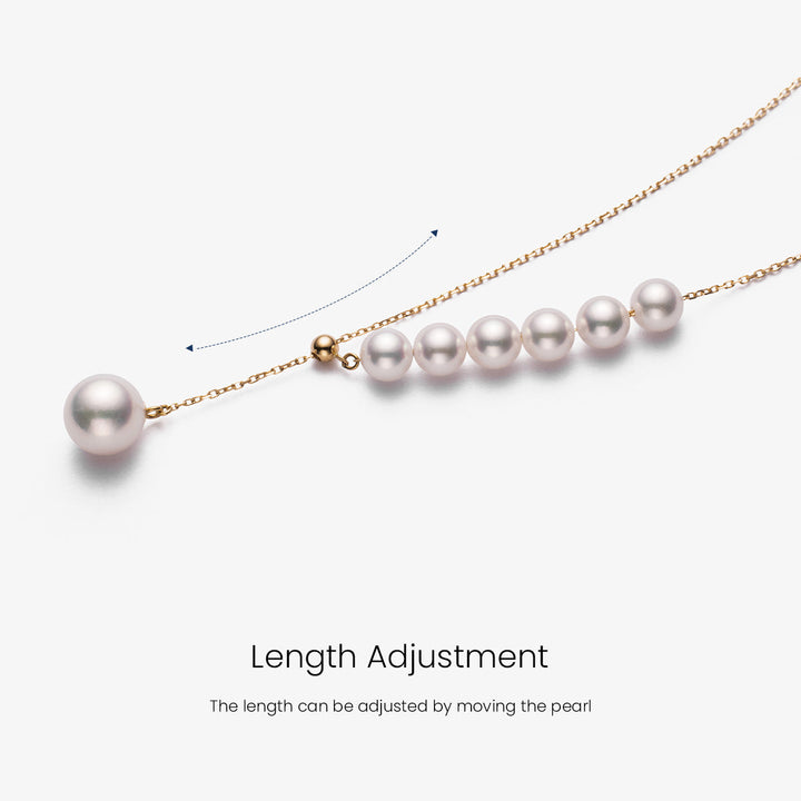 Asymmetrical Akoya pearl necklace with 18K gold chain from Mermaid's Tear Collection, showcasing elegant pearl and gold design.