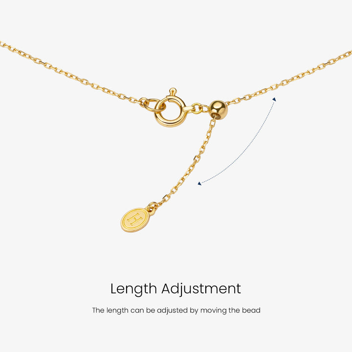 Tahitian pearl round pendant necklace in 18K gold from Mystery Collection, featuring a lustrous black pearl on a delicate chain.