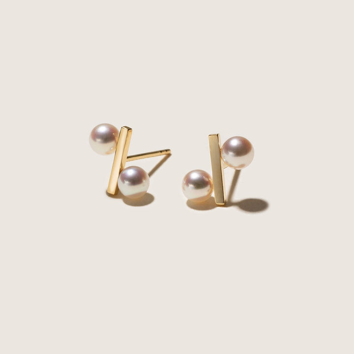 Gold vermeil freshwater pearl percent bar stud earrings, flat lay, pair