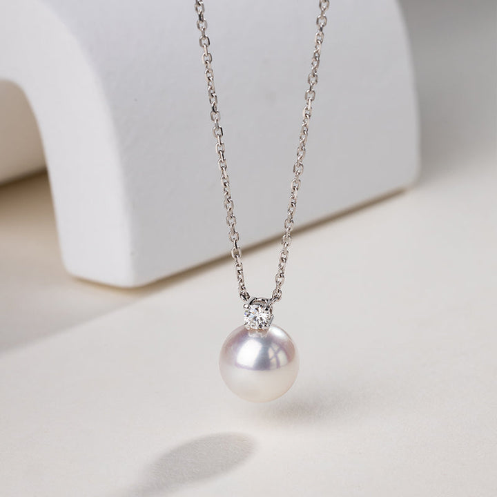 Premier Akoya Pearl 18K gold diamond necklace from Possibility Collection featuring a lustrous pearl and sparkling diamonds.