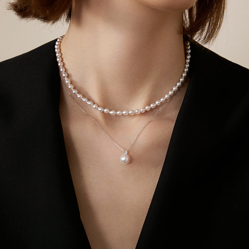 Possibility Collection Premier Akoya Pearl 18K Gold Diamond Necklace featuring a lustrous pearl, gold chain, and diamond accents.