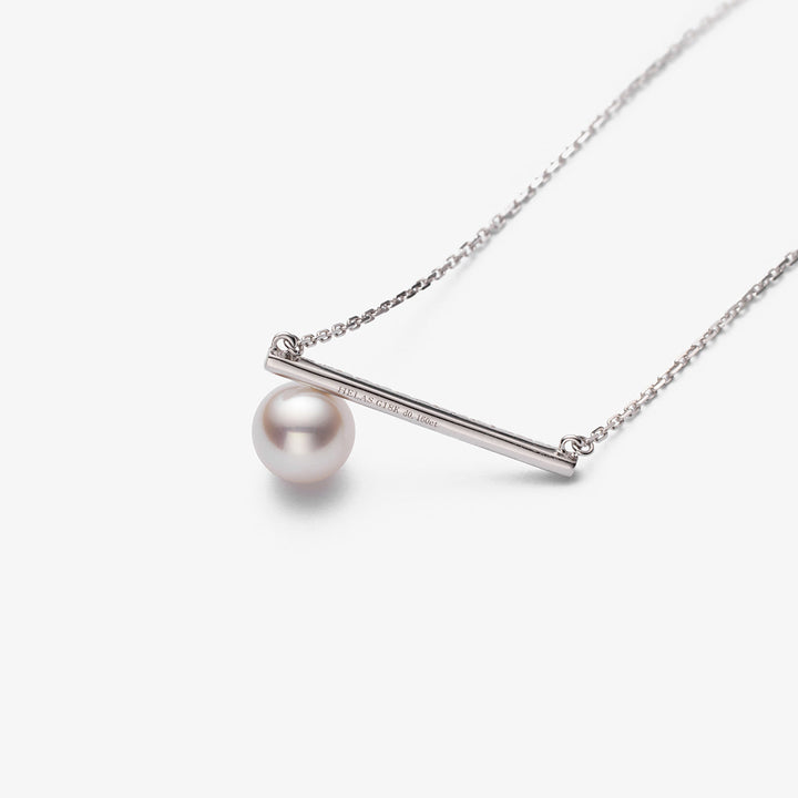 Akoya pearl and moon-shaped diamond necklace in 18K white gold from Reflection Collection, showcasing elegant jewelry design.