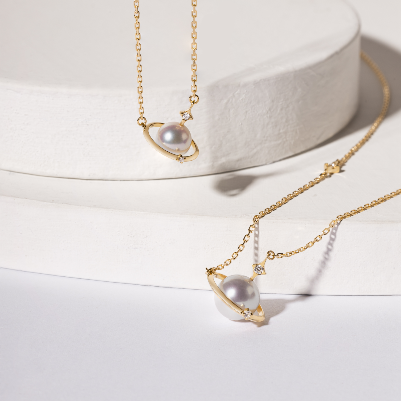 Saltwater pearl 18K gold diamond planet necklace from Star Trails Collection, featuring a delicate celestial design.