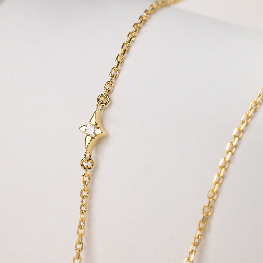Saltwater pearl and diamond planet necklace in 18K gold from Star Trails Collection, showcasing a celestial-inspired design.
