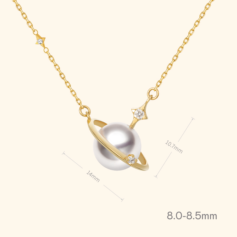Saltwater pearl 18K gold necklace with diamond planet pendant from Star Trails Collection, featuring a celestial-inspired design.