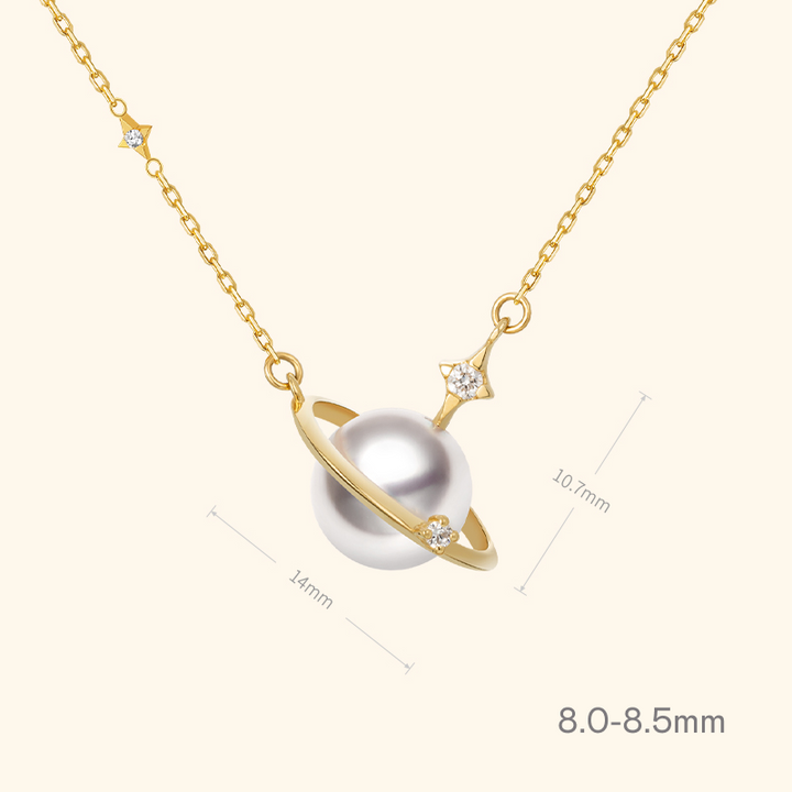 Saltwater pearl 18K gold necklace with diamond planet pendant from Star Trails Collection, featuring a celestial-inspired design.
