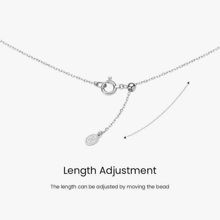 Sterling silver spring ring clasp with adjustable bead and H logo tag, length adjustment detail