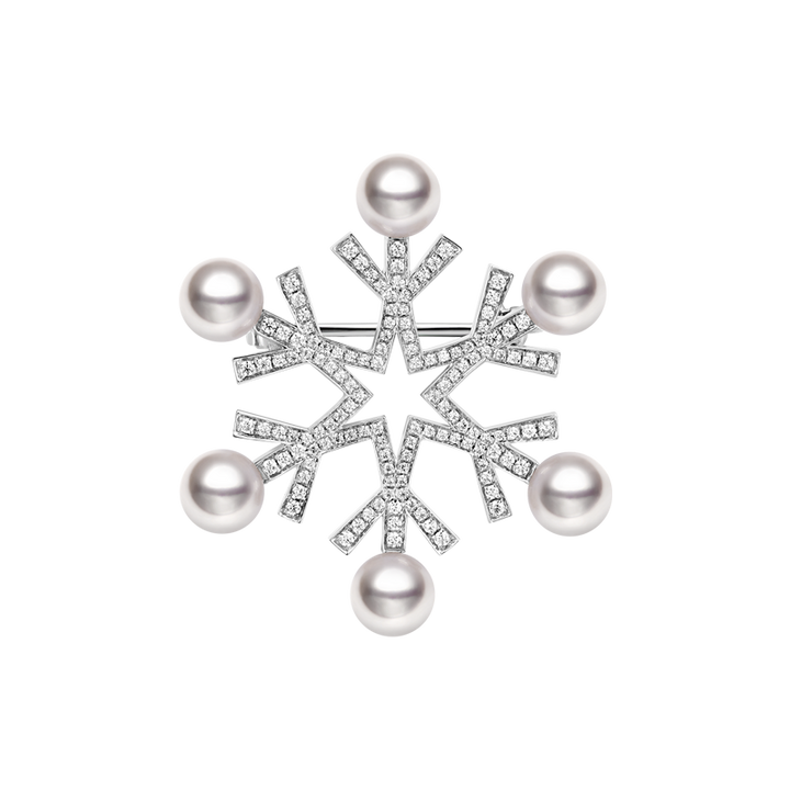 Akoya pearl and 18K gold Christmas snowflake brooch from Wish Collection, featuring intricate snowflake design with pearl accents.