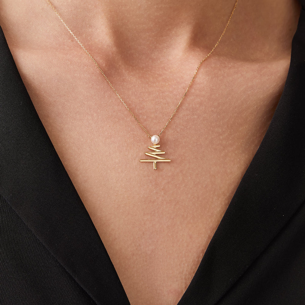 Akoya pearl Christmas tree necklace with 18k yellow gold from Wish Collection, featuring a pendant shaped like a festive holiday tree.