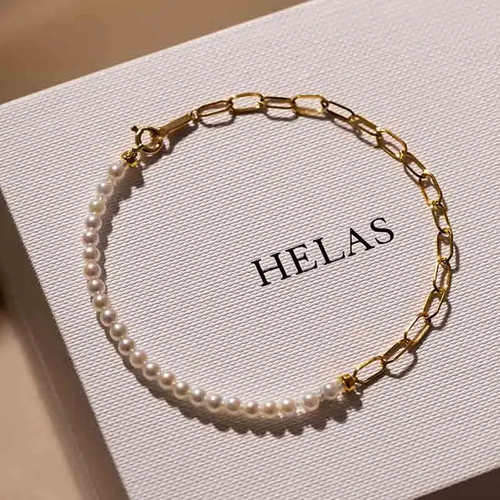 Freshwater pearl gold vermeil half chain sterling silver bracelet displayed on HELAS jewelry box